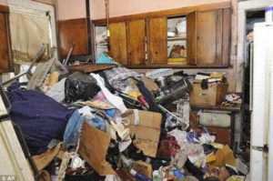 hoarder cluttering a kitchen